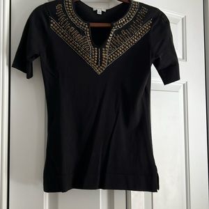 Cute black sweater top with beading neckline